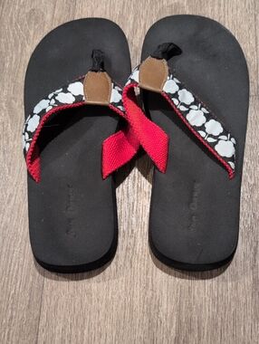 Yellow Box Black Flip Flops with Red and White Floral Straps
